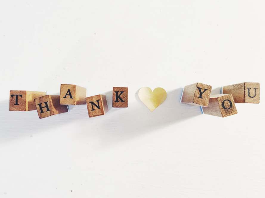 wooden toy blocks that spell out thank you