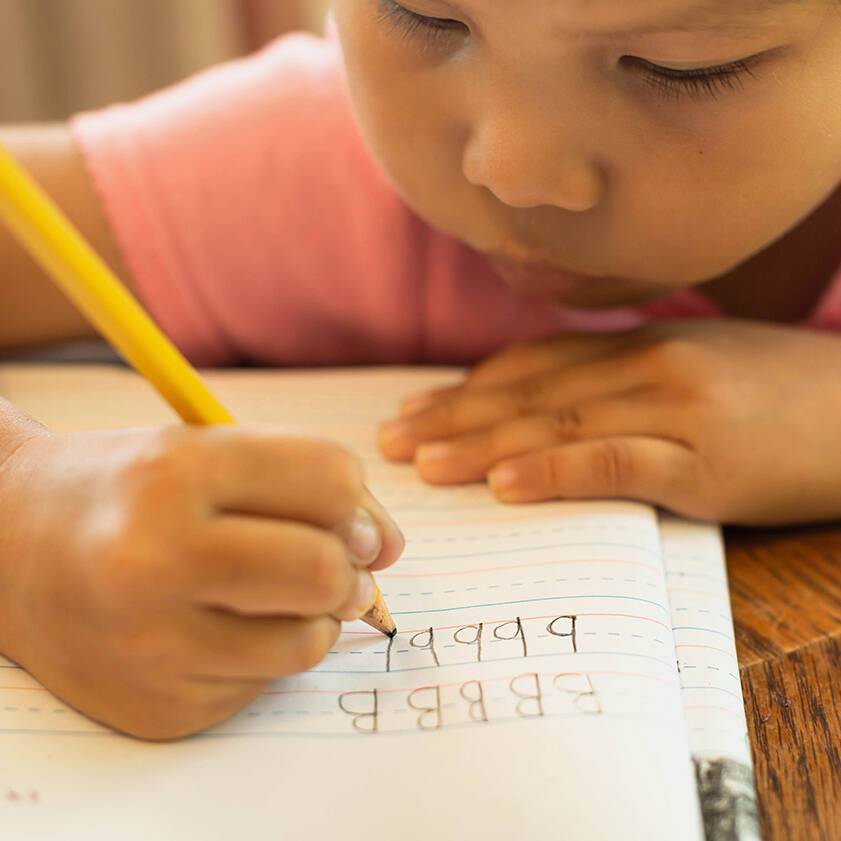 Child learning how to write