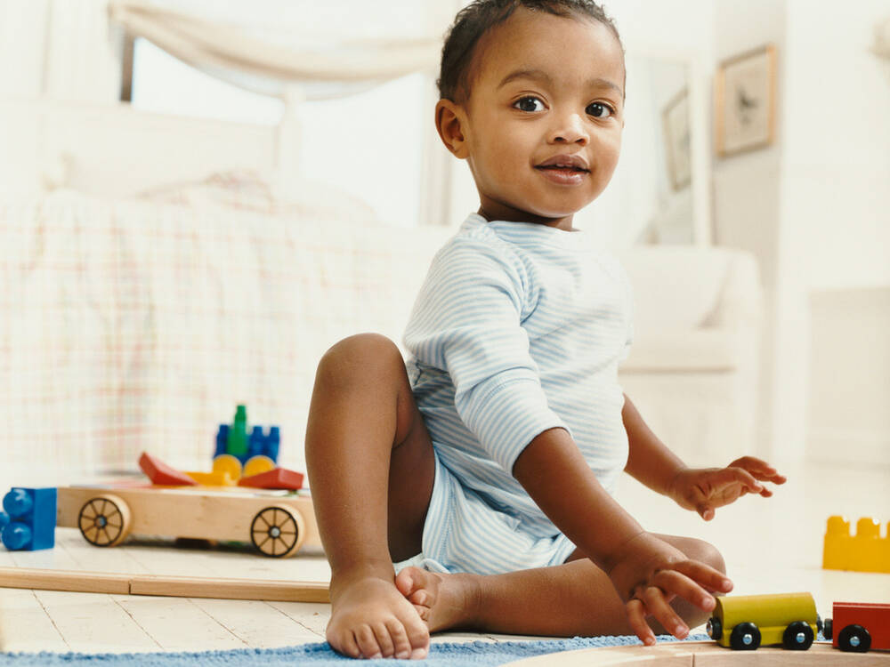 little boy crawling on floor small