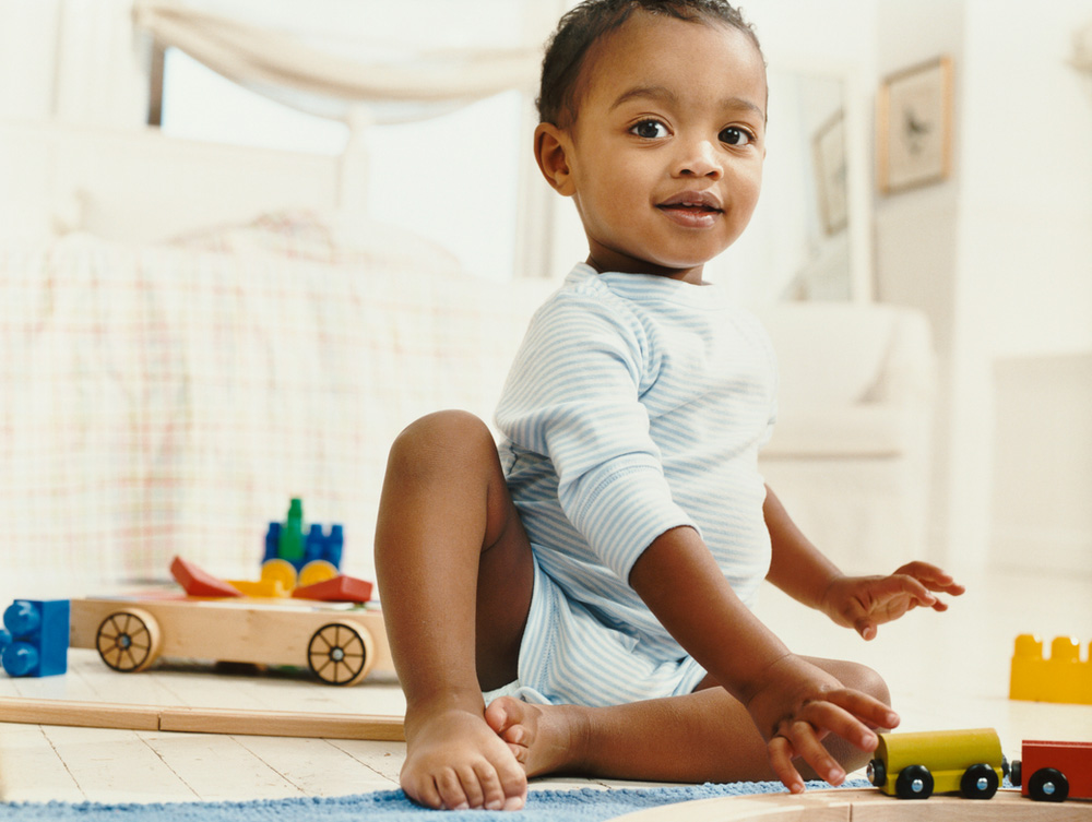 little boy crawling on floor small